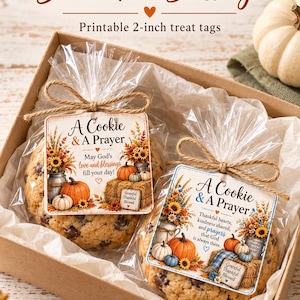 May include: Two chocolate chip cookies in clear plastic bags with twine bows and square paper tags. Tags feature autumn illustrations of pumpkins, sunflowers, and text reading A Cookie & A Prayer, 5 cm treat tags, and fall blessings.