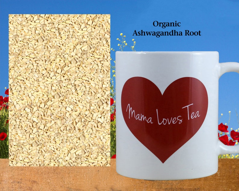 May include: A white ceramic mug with a red heart design that says "Mama Loves Tea". The mug is sitting on a wooden surface. The background is a blue sky with white clouds. There is a pile of organic Ashwagandha root in the upper left corner of the image.