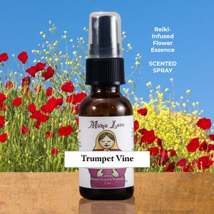 May include: A brown glass bottle with a black spray top labeled "Mama Love" and "Trumpet Vine." The bottle contains a scented spray and is set against a backdrop of red poppies and yellow flowers under a blue sky.