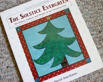 The Solstice Evergreen -- The History, Folklore and Origins of the Christmas Tree, a book by Etsy seller Sheryl Karas