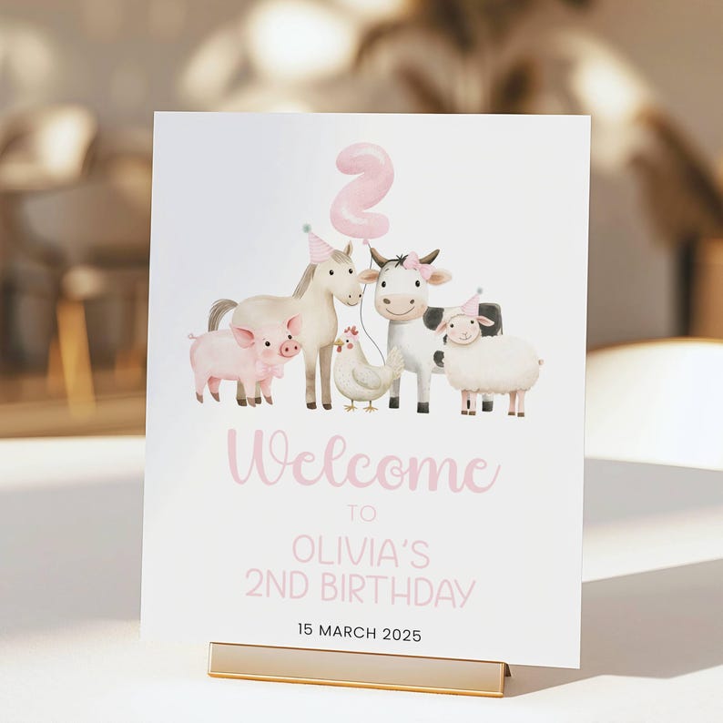 May include: Welcome to Olivia's 2nd Birthday sign featuring a pink number 2 balloon and farm animal illustrations. The sign reads "Welcome to Olivia's 2nd Birthday" and "15 March 2025".