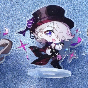 May include: Three anime character acrylic stands with a sparkly background. The characters are all young men with white hair and different outfits. The stand on the left has a blue and white checkered pattern, the middle stand has a red and black pattern, and the stand on the right has a gold and black pattern. The text "ACGCrafts" is visible in the bottom right corner of the image.