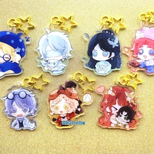 May include: Seven acrylic keyrings with anime-style character designs. Each keyring has a gold star-shaped clasp. The characters have large eyes and wear various outfits, with vibrant colours including blue, pink, and red.