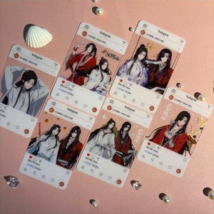 May include: A collection of six clear acrylic Instagram-themed stickers featuring anime-style illustrations of characters in various poses. Each sticker has a different image, with a pink background and decorative elements.