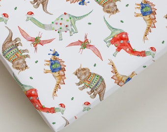 Christmas Wrapping Paper featuring cute Dinos in Christmas Sweaters. Perfect for kids and Dinosaur lovers!