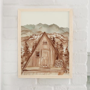 A-Frame Cabin Art Print - Printed Wall Art featuring mountains and a cozy cabin