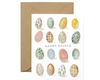 May include: A white card with the text "Happy Easter" in the center. The card is decorated with 16 watercolor painted Easter eggs in various colors and patterns.