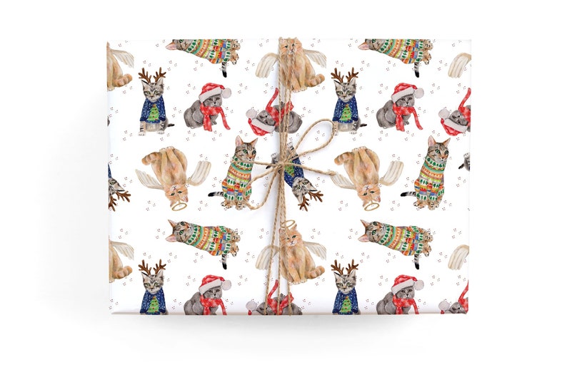 Holiday Cat Gift Wrap featuring cats in holiday outfits- this Cat Christmas Wrapping Paper makes for a fun cat lovers gift 