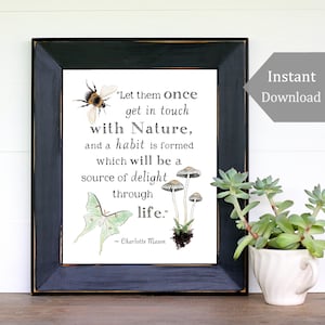 May include: A black framed print with a white background and a quote about nature. The quote reads "Let them once get in touch with Nature, and a habit is formed which will be a source of delight through life." - Charlotte Mason. The print features illustrations of a bumblebee, a moth, and mushrooms.