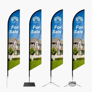 May include: Four tall, blue and white feather flags with the words "For Sale" and a real estate logo. Each flag features a house image and is mounted on a black pole with different base styles, including a spike, square base, and cross base.