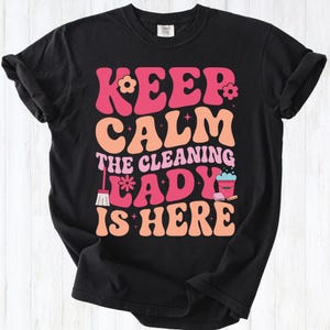 May include: A set of three ceramic mugs with a speckled, matte finish. The mugs are in shades of cream, light gray, and dark gray. Each mug has a simple, minimalist design and a rounded handle.