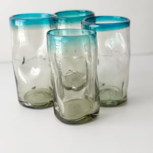 Hand Blown Set of 4 Glass Drinking Tumblers Con-caved Sides Blue Rim