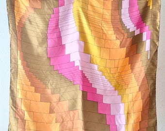 Bufanda vintage con degradado geométrico en bloque de color naranja, rosa y marrón