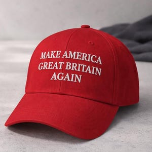 May include: A red baseball cap with a curved peak. The cap displays the white text "MAKE AMERICA GREAT BRITAIN AGAIN". The cap is made of a durable material and has a rounded crown. A classic style.