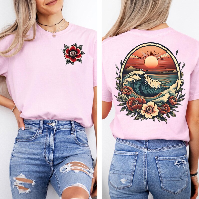 May include: Pink t-shirt with a floral design on the left side and a vintage-style illustration of a wave, sunset, and flowers on the back.