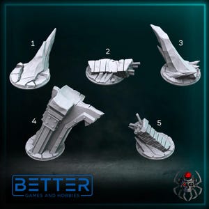 May include: Five grey miniature terrain pieces for tabletop gaming, including jagged rock formations, a broken bridge, and architectural elements, all on circular bases. The "BETTER GAMES AND HOBBIES" logo is at the bottom of the image.