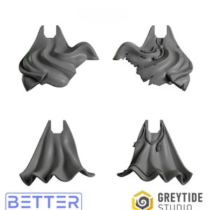 May include: Four different styles of 3D printed capes for miniature figures. The capes are made of a smooth, grey plastic and have a variety of folds and textures. Two of the capes have rope trim.
