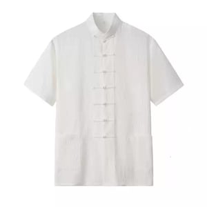 May include: A white short-sleeved shirt with a mandarin collar and a row of buttons down the front.