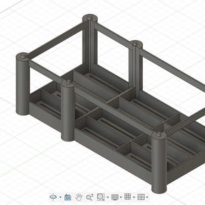 May include: A 3D-rendered soap holder design in a gray color. The design features a rectangular base with multiple compartments and vertical supports. The text "Soap Holder Proto A1 v12" is visible in the top left corner.