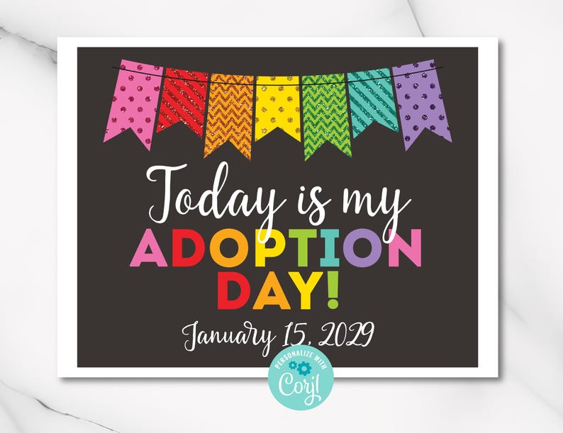 May include: A black and white printable sign with a rainbow banner at the top. The sign says "Today is my Adoption Day!" with the date "January 15, 2029" below.