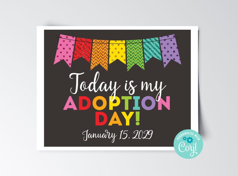 May include: A black and white printable sign with colorful bunting at the top. The sign says "Today is my ADOPTION DAY! January 15, 2029".
