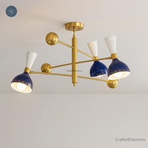 Elevate your space with the 3-Arms 6-Lights Stilnovo Brass Bespoke Chandelier