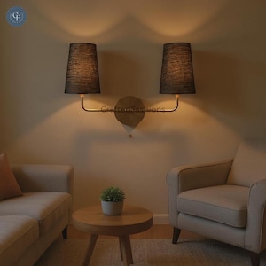 The 2 Shade Wall Lamp in black offers sleek, adjustable shades for modern lighting