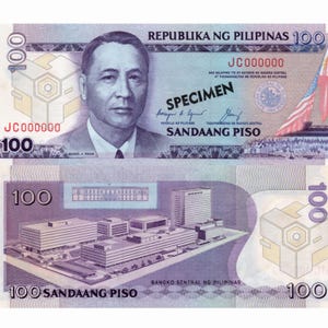 May include: A 100 Philippine Peso banknote featuring a portrait of Manuel A. Roxas, the first president of the Philippines, and a building with the text "Bangko Sentral ng Pilipinas" on the bottom. The banknote is marked "Specimen" and has the serial number "JC000000".