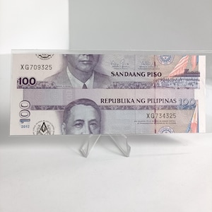 Filippijnse 100 piso-bankbiljet MASON-opdruk: 2012 verkeerd gesneden biljet van ongesneden vel, kunstmatige fout, nieuwtje, serienummer XG709325/734325