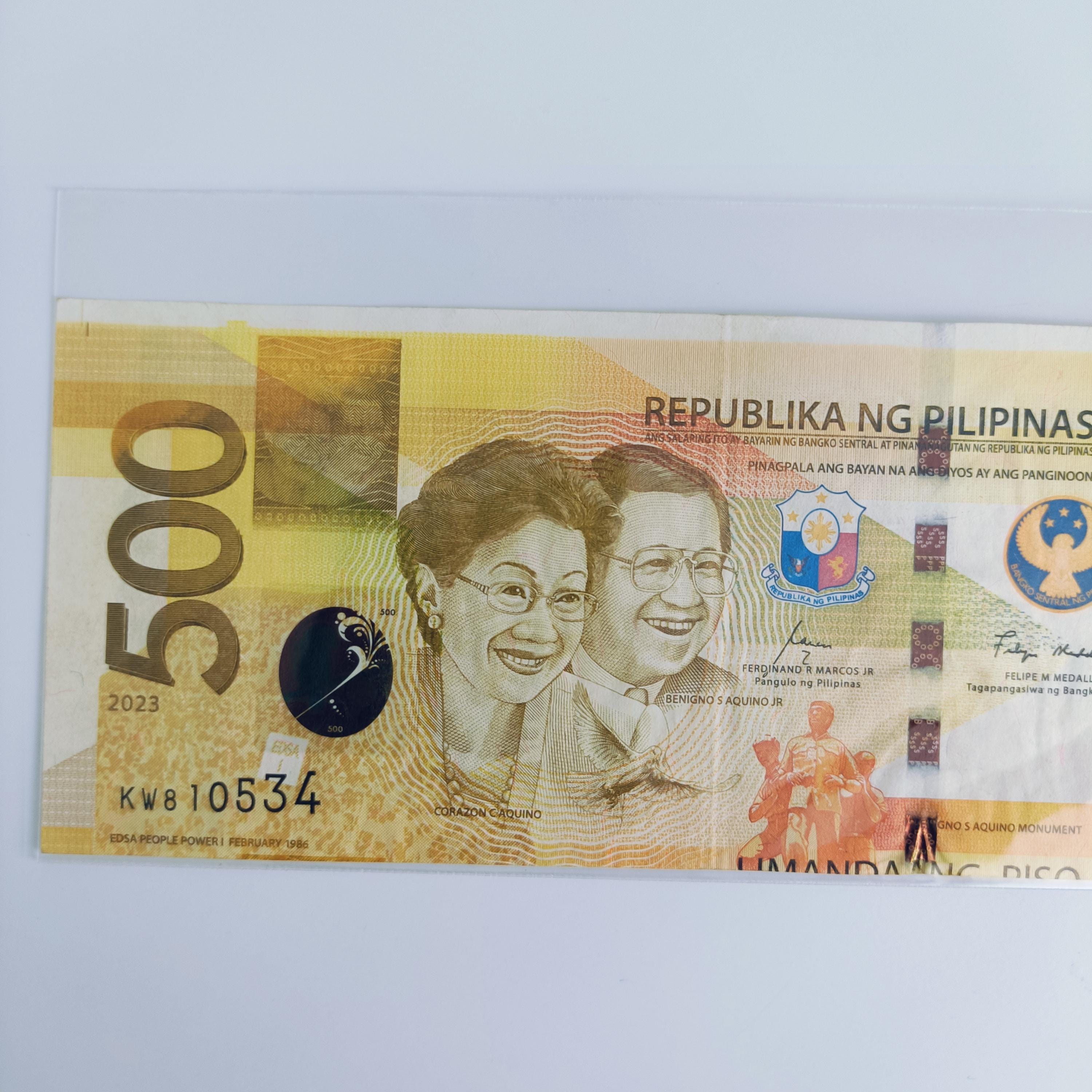 フィリピン　ニノイアキノ500ペソSPECIMEN (見本) il_fullxfull.6271855255_ljkc.jpg
