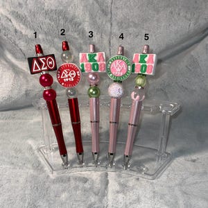 Sorority beaded pens. Makes a great gift. Each pen comes with a free ink refill.