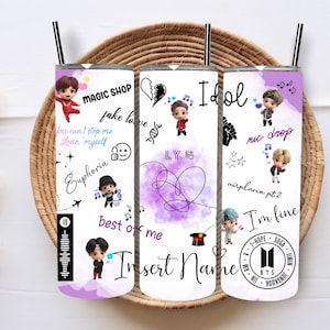 May include: Three stainless steel tumblers with a white background and purple accents. The tumblers feature images of cartoon characters and text related to the South Korean boy band BTS. The text includes song titles such as "Fake Love", "Idol", "Mic Drop", "Euphoria", "Best of Me", "Airplane pt2", and "I'm Fine". The tumblers also feature the BTS logo and the text "Insert Name".