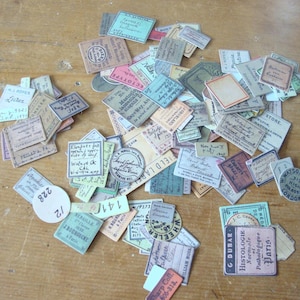 Tim Holtz ideology, ephemera snippets pack, vintage bottle labels, paper crafting, mini labels, mixed media art supplies, collage making
