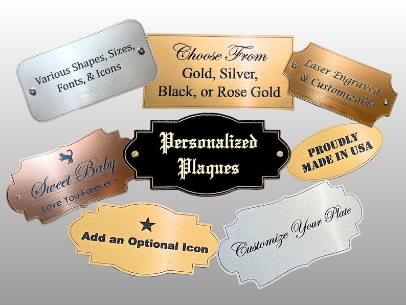 May include: A collection of metal plaques in various shapes and finishes including gold, silver, black, and rose gold. The plaques feature laser-engraved text such as Personalized Plaques, Sweet Baby, and Customize Your Plate, with some including icons.