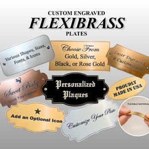May include: A collection of custom engraved Flexibrass plates in gold, silver, black, and rose gold colors. The plates feature various shapes and text including Personalized Plaques, Sweet Baby, and Customize Your Plate. A circular inset shows the flexible material.