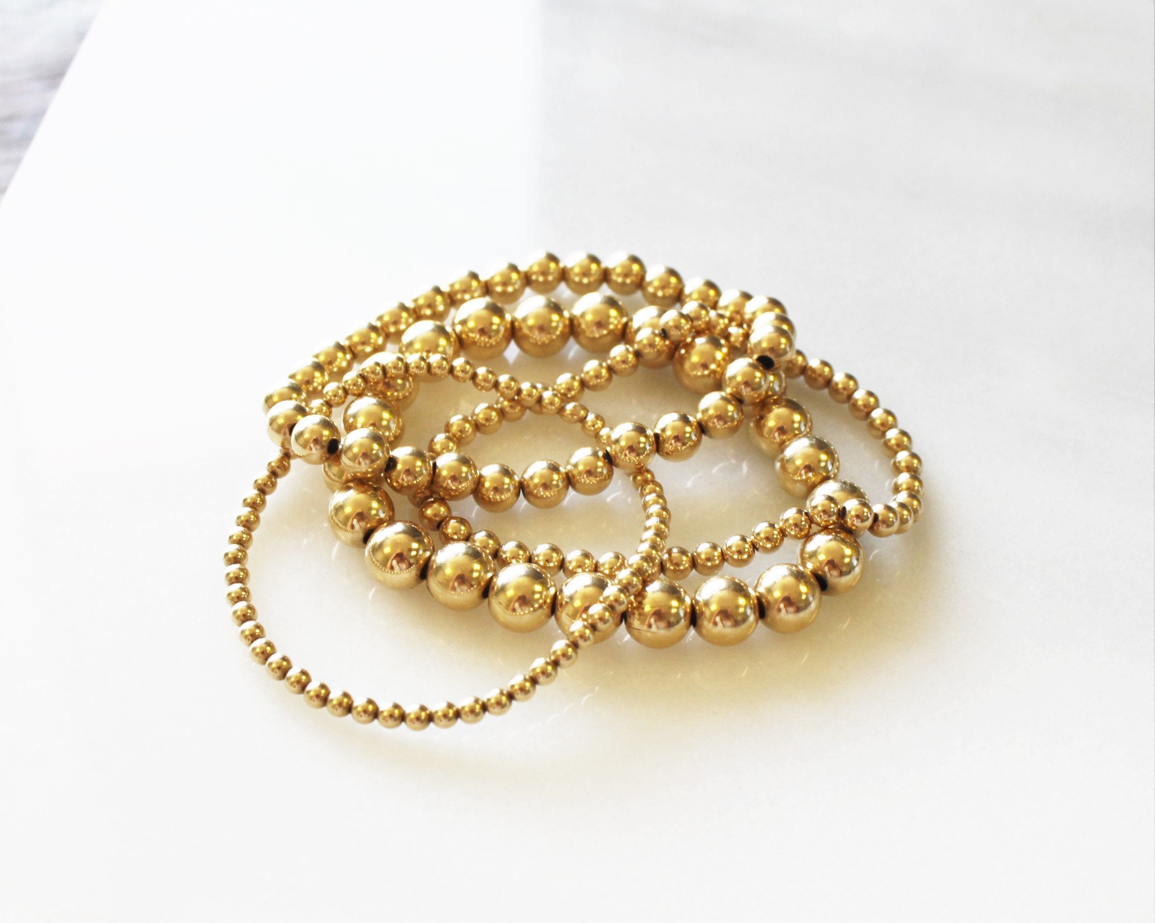 gold bracelets for her