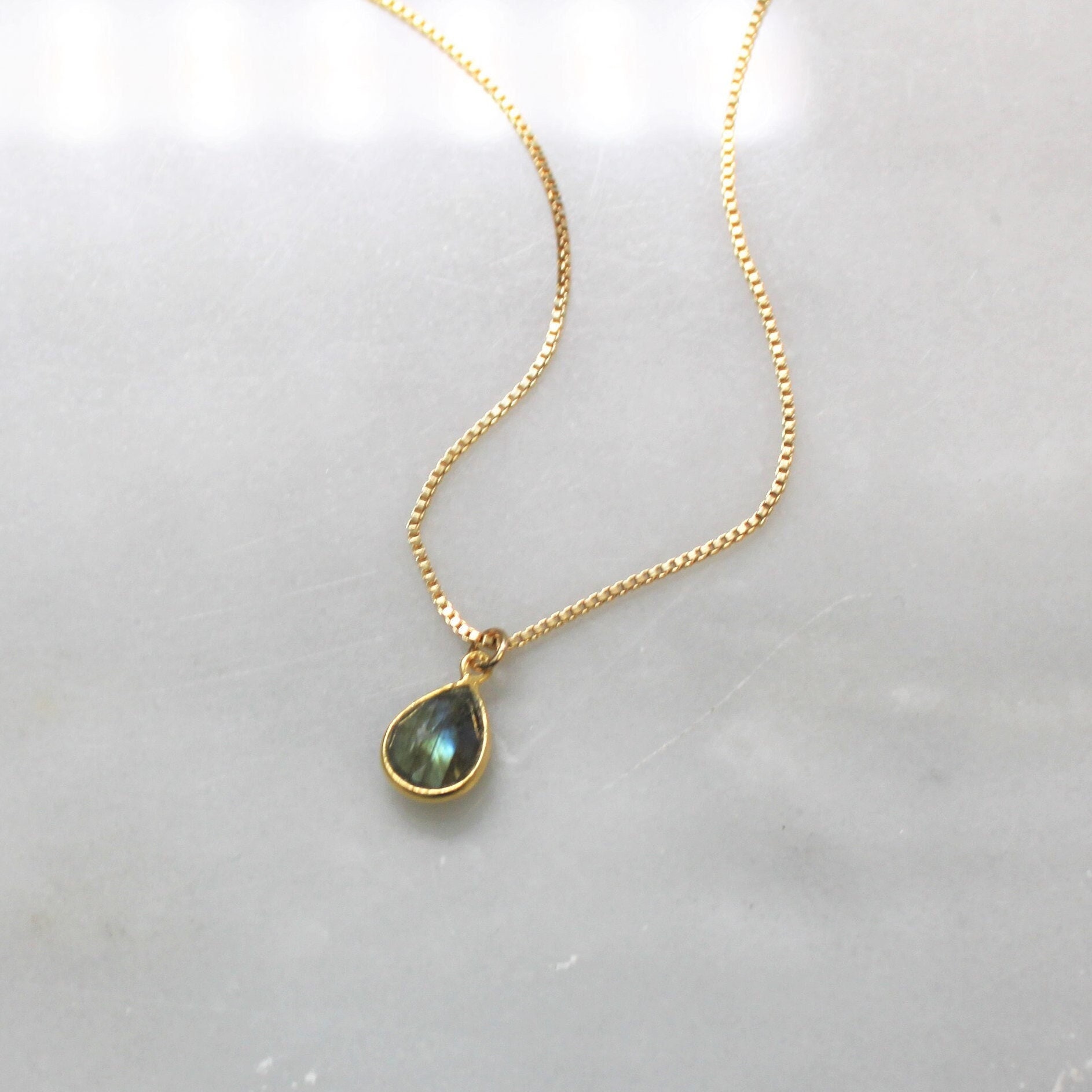 Gold gem best sale necklace