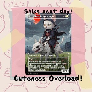May include: A fantasy art card depicting a white cat in a black cloak riding a white dog-like creature. The card reads "Charismatic Conqueror" and "Creature - Vampire Soldier". The background is pink with cat drawings.