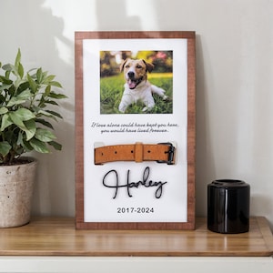 May include: A wooden frame with a photo of a dog, a brown leather collar, and the text "If love alone could have kept you here, you would have lived forever. Harley 2017-2024".