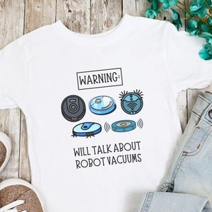 ロボット掃除機に夢中な幼児用シャツ、おもしろキッズTシャツ