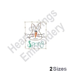 May include: An embroidered design featuring a bunny face with a carrot nose and the word "Spring" in green. The design is framed with a stitched border, ideal for spring-themed crafts.