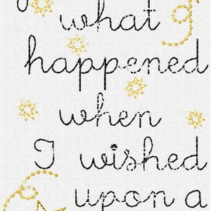 May include: Black and gold embroidery on white fabric with the text "You are what happened when I wished upon a star".