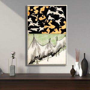 May include: A framed art print featuring a two-part design. The top section shows white birds against a black and yellow background. The bottom section depicts a green and white landscape with a linear pattern.