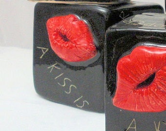 Ceramic cube message box, A Kiss Is...black with red lips bead rattle