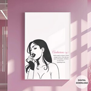 Puede incluir: Una impresión en blanco y negro de una mujer aplicándose lápiz labial, con la palabra "Audacious" y su definición. La impresión es una descarga digital, mostrada en un marco blanco.