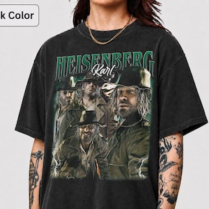 May include: Black t-shirt with a graphic of a man with a beard and hat, and the text "HEISENBERG Karl" in green. The image has a vintage, distressed appearance.