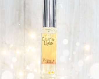 December Lights Perfume | Radiant Bergamot, Orange, White Tea, Sugar Plum, and Sandalwood