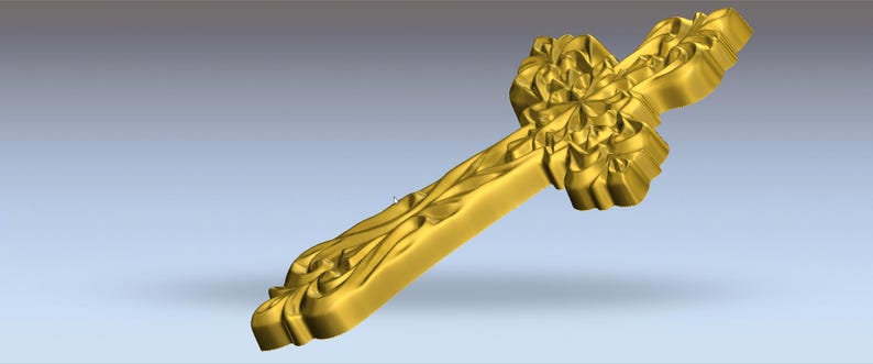 May include: A gold-coloured, ornate cross with detailed floral and leaf patterns. The cross has a three-dimensional design with a textured surface. The arms and stem of the cross are decorated with carved embellishments, creating a religious symbol.