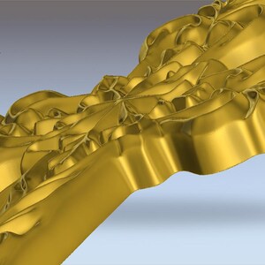 May include: A gold-coloured, ornate cross with a detailed, textured surface. The cross has a three-dimensional design with intricate floral and scrollwork patterns. The object is set against a gradient background.