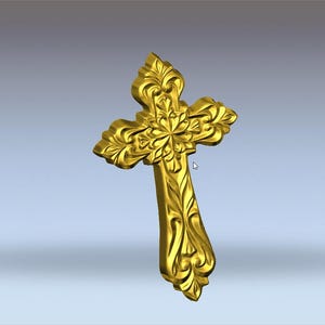 May include: A gold-coloured cross featuring elaborate floral and scrollwork. The cross has a gently curved shape and is set against a soft, gradient background. The detailed design suggests a religious or decorative item.